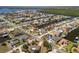 Aerial view of a canal-front community with waterfront homes and boat docks at 4279 Harbor Blvd, Port Charlotte, FL 33952