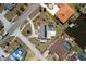 Birds eye view of a residential area featuring pools, lush landscaping, and waterfront access at 4279 Harbor Blvd, Port Charlotte, FL 33952