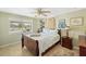 Comfortable bedroom with natural light, a ceiling fan, and charming decor throughout at 4279 Harbor Blvd, Port Charlotte, FL 33952