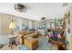 Cozy living room featuring comfortable seating, bright natural light, and coastal decor at 4279 Harbor Blvd, Port Charlotte, FL 33952