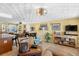 Cozy living room features textured ceilings, neutral-toned walls, and comfortable seating arrangements at 4279 Harbor Blvd, Port Charlotte, FL 33952