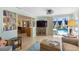 Inviting living room with access to the outdoor pool area and stylish decor at 4279 Harbor Blvd, Port Charlotte, FL 33952