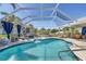 Enclosed swimming pool with a covered lanai, perfect for relaxing and entertaining outdoors at 4279 Harbor Blvd, Port Charlotte, FL 33952