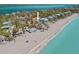 Beautiful beachfront home showcasing stunning ocean views and neighborhood in a desirable coastal community at 6112 Gnarled Oak Dr, Englewood, FL 34223