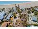 Beautiful aerial view of a property, highlighting the lot, fencing, and proximity to the beach at 6112 Gnarled Oak Dr, Englewood, FL 34223