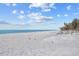 Scenic beach with clear blue water and bright skies at 6112 Gnarled Oak Dr, Englewood, FL 34223