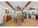 Cozy dining room with natural accents, flowing into a bright, modern kitchen at 6112 Gnarled Oak Dr, Englewood, FL 34223