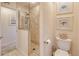 Bathroom featuring a walk-in shower and coastal-themed artwork at 815 Via Formia, Punta Gorda, FL 33950