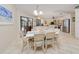 The dining area, adjacent to the kitchen, offers a seamless flow for everyday meals and entertaining at 815 Via Formia, Punta Gorda, FL 33950