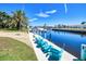 Beautiful waterfront views featuring a dock with multiple chairs and clear waterways perfect for relaxing or boating at 815 Via Formia, Punta Gorda, FL 33950