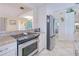 This well-equipped kitchen features stainless steel appliances and granite countertops for a modern touch at 815 Via Formia, Punta Gorda, FL 33950