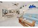 Spacious living room provides a welcoming atmosphere with views of the dining area and kitchen at 815 Via Formia, Punta Gorda, FL 33950