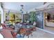 Enclosed patio featuring comfortable seating with outdoor views at 815 Via Formia, Punta Gorda, FL 33950