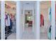 Walk-in closets featuring ample storage space and convenient access from the bedroom at 815 Via Formia, Punta Gorda, FL 33950