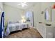 Charming bedroom featuring twin beds, unique decor, and lots of light at 9020 Eagle Bay Ct, North Port, FL 34287