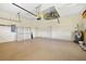 Spacious two car garage featuring lots of room for storage and utility hookups at 9020 Eagle Bay Ct, North Port, FL 34287