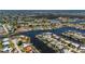 Unique aerial perspective of home with direct canal access in a peaceful, residential area at 1206 Winward Ct, Punta Gorda, FL 33950
