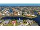 Captivating aerial view of a waterfront home with canal access in a vibrant residential community at 1206 Winward Ct, Punta Gorda, FL 33950