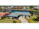 An aerial view of a lovely waterfront home with a private canal and gorgeous curb appeal at 1206 Winward Ct, Punta Gorda, FL 33950