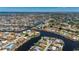 Expansive aerial view highlighting the canal-front property and its tranquil, neighborhood setting at 1206 Winward Ct, Punta Gorda, FL 33950