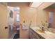 Cozy bathroom with a large mirror and a unique, timeless design at 1206 Winward Ct, Punta Gorda, FL 33950