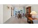 The dining room features a dining table, cabinet and natural light that streams in from the outside at 1206 Winward Ct, Punta Gorda, FL 33950