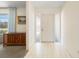 Bright foyer with tile flooring, sidelight windows, and adjacent living space at 1206 Winward Ct, Punta Gorda, FL 33950