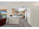 A functional kitchen featuring a breakfast bar and an open layout to the dining room at 1206 Winward Ct, Punta Gorda, FL 33950