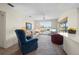 Bright living room offering waterfront views, comfortable seating, and a ceiling fan for optimal air circulation at 1206 Winward Ct, Punta Gorda, FL 33950