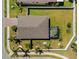 Aerial view of a single-Gathering home with a fenced backyard and screened patio at 15288 Mille Fiore Blvd, Port Charlotte, FL 33953