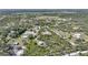 High aerial view of several residential properties in rural area at 16180 Forest Glen Ct, Punta Gorda, FL 33982