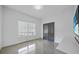 Bright bedroom features a large window and closet at 16180 Forest Glen Ct, Punta Gorda, FL 33982