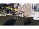 Aerial view of a home with a dock, perfect for enjoying waterfront living at 2061 S Pine St, Englewood, FL 34224