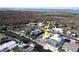 Aerial view of a coastal community with homes along canals, offering waterfront living at 2061 S Pine St, Englewood, FL 34224
