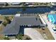 Home with a circular driveway near the water offers curb appeal and convenient parking at 234 Tait Se Ter, Port Charlotte, FL 33952