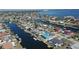 Real estate showcasing a residential area with canal access, private docks, and waterfront homes at 234 Tait Se Ter, Port Charlotte, FL 33952