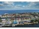 Aerial shot showcasing a residential community with canal-front homes, private docks, and waterfront living at 234 Tait Se Ter, Port Charlotte, FL 33952