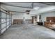 Spacious garage with ample room for storage and a workbench for projects at 234 Tait Se Ter, Port Charlotte, FL 33952