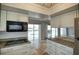 Updated kitchen with granite countertops and stainless steel appliances; a great pool view from the sink at 234 Tait Se Ter, Port Charlotte, FL 33952