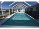 Backyard pool is ideal for cooling off on hot days and entertaining guests at 234 Tait Se Ter, Port Charlotte, FL 33952
