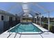 Enclosed pool area offering privacy and protection for year-round enjoyment at 234 Tait Se Ter, Port Charlotte, FL 33952