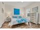 Cozy bedroom with comfortable bedding and decorative accents at 240 W End Dr # 312, Punta Gorda, FL 33950