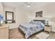 Comfortable bedroom with blue and white bedding and warm, natural lighting at 240 W End Dr # 312, Punta Gorda, FL 33950