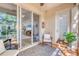 Outdoor lanai area showing sliding glass doors leading to the home's interior at 240 W End Dr # 312, Punta Gorda, FL 33950