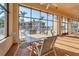 Enclosed patio with seating area offering pool views and natural light at 240 W End Dr # 312, Punta Gorda, FL 33950