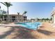 Inviting community pool with lounge chairs and palm trees, perfect for relaxation at 240 W End Dr # 312, Punta Gorda, FL 33950
