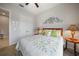 This bedroom features a plush bed with decorative pillows and a cozy quilt at 24407 Riverfront Dr, Punta Gorda, FL 33980