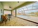 Covered lanai with retractable screens and a pool, ideal for year-round outdoor enjoyment at 24407 Riverfront Dr, Punta Gorda, FL 33980