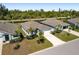 Charming single-story homes feature lush landscaping, manicured lawns, and private driveways in a desirable neighborhood at 25292 E Lenox Cir, Punta Gorda, FL 33950