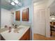 Well-lit bathroom with a modern sink and spacious countertop at 3753 Aba Ln, North Port, FL 34287